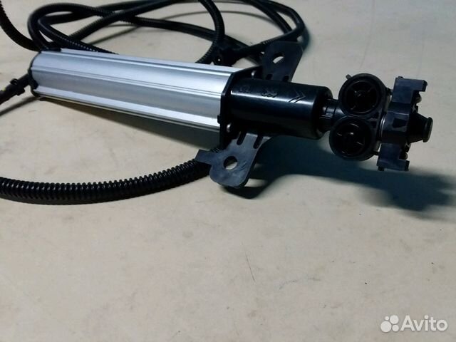 Фарсунка омывателя фары левая Peugeot 308