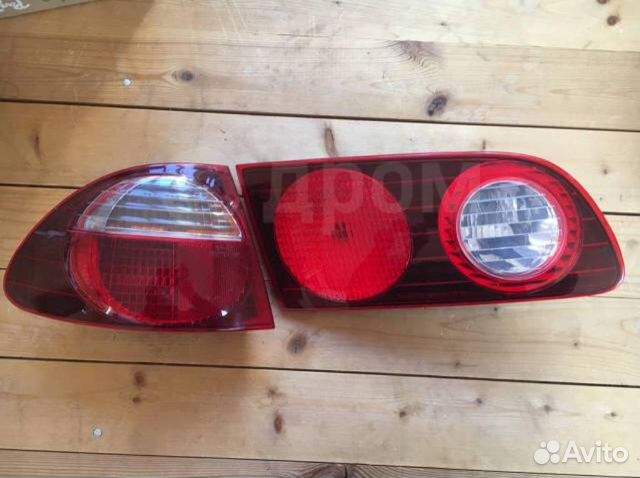 Задние фонари Caldina ST215 левый и правый