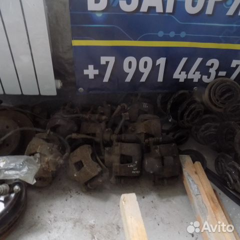 Суппорт тормозной на Лачетти,Нексия оригинал