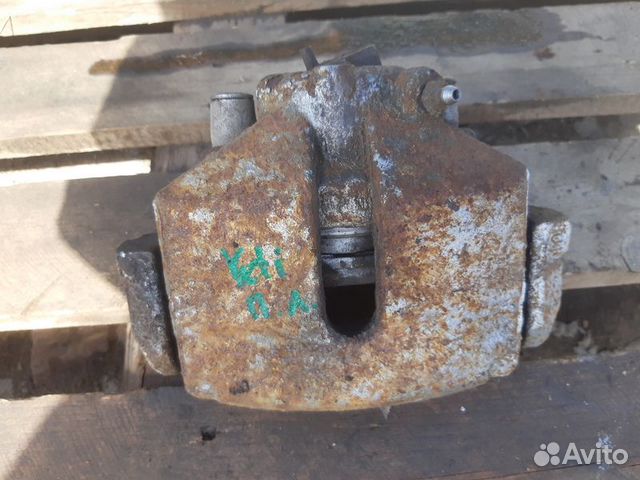 Суппорт тормозной передний левый Skoda Yeti