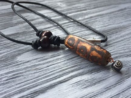 Бусина дзи 9 глаз - самая сильная и популярная на