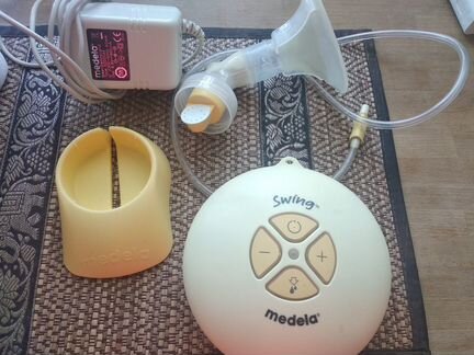 Молокоотсос medela swing