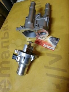 Корпус термостата новый Chevrolet Opel