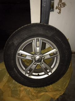 Продам зимние шипованные колеса с дисками 215/70R1